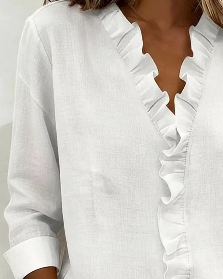 AIRA™|RUFFLED V-NECK BLOUSE